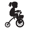 little girl riding trike