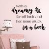 With a dreamy far off look and her nose stuck in a book with a rose wall quotes vinyl lettering wall decal home decor kids disney beauty and the beast read reading book literature belle bookcase library